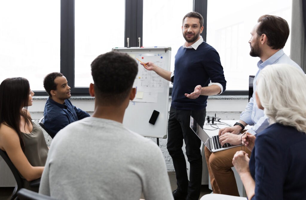 business team discussing their ideas while working in office